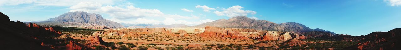 Panoramic view of mountains against sky