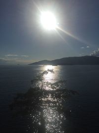 Sun shining over sea