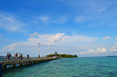 Scenic view of sea against blue sky