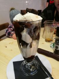 Close-up of ice cream in glass on table