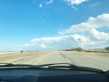 Road seen through car windshield