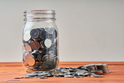 Close-up of coins on table