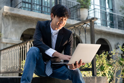 Young man using laptop