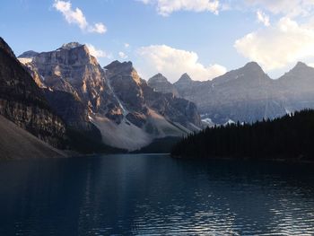 Scenic view of mountains and lake against sky