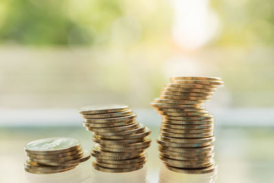 Close-up of coins on table