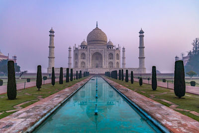 Taj mahal is an ivory white marble mausoleum on yamuna river, agra, uttar pradesh, india.