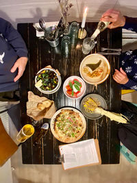 High angle view of people having food in restaurant