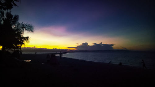 Scenic view of beach during sunset