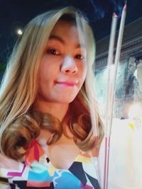 Portrait of young woman looking away