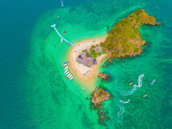 High angle view of people swimming in sea