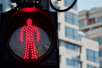 Low angle view of illuminated road sign