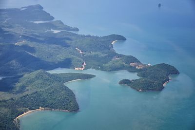 High angle view of island in sea against sky