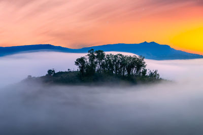 Scenic view of mountains against sky during sunset