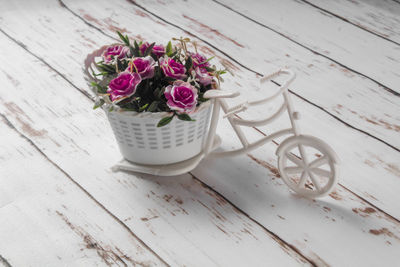 High angle view of pink roses on table