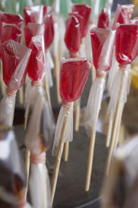 Close-up of candies wrapped in plastic for sale at market stall