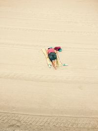 Man sleeping on shore