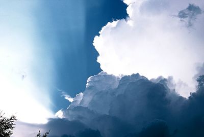 Scenic view of mountains against dramatic sky