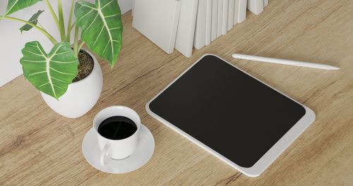 High angle view of coffee cup on table