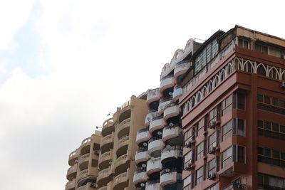 Low angle view of buildings against sky