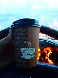 Close-up of hand holding drink