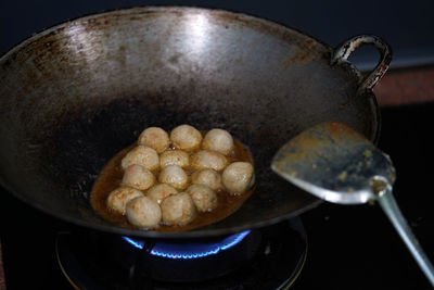 High angle view of meat in cooking pan