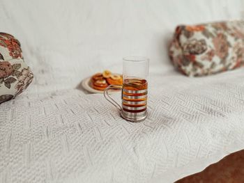 Close-up of glass jar on table