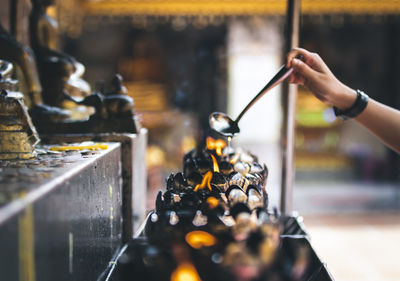 Close-up of person preparing food