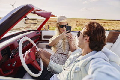 Woman sitting in car