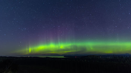 Scenic view of star field against sky at night