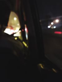 Close-up of illuminated car at night