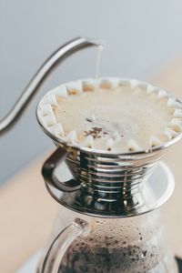 Close-up of coffee cup on table