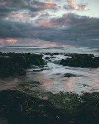 Scenic view of sea against sky during sunset