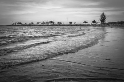 Scenic view of beach against sky