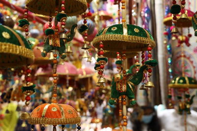 Close-up of decoration hanging for sale in market