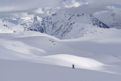 Scenic view of snowcapped mountain against sky