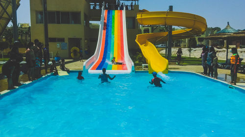 People enjoying in swimming pool