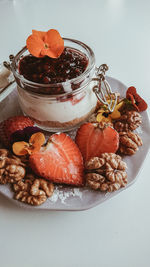 High angle view of strawberries in plate on table