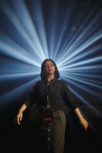 Woman standing on stage