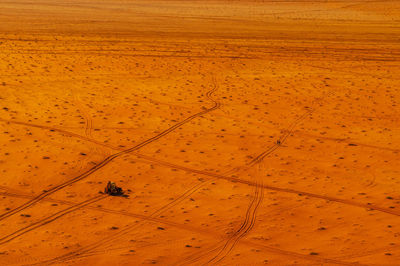 High angle view of earthmover on desert