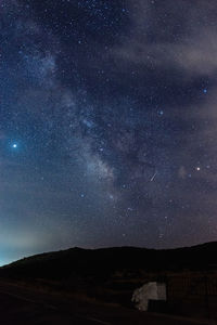 Low angle view of star field against sky at night