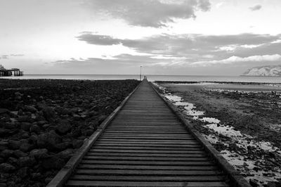 Surface level of beach against sky