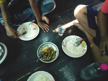 High angle view of people having food