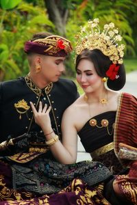 Portrait of the bride and groom in traditional clothes