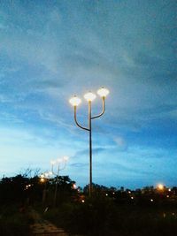 View of illuminated street light against sky