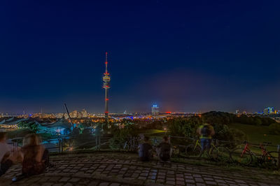 Illuminated city buildings at night