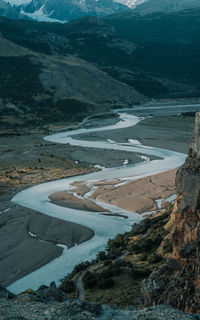 High angle view of river amidst land