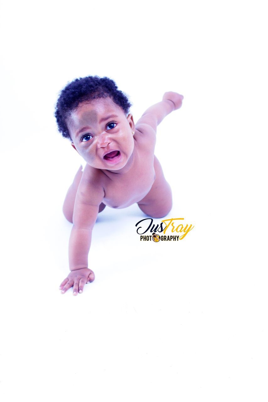 baby, babies only, looking at camera, full length, baby clothing, innocence, studio shot, smiling, portrait, white background, babyhood, happiness, one person, childhood, real people, cheerful, mammal, people, day