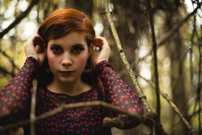 Portrait of a young woman in forest