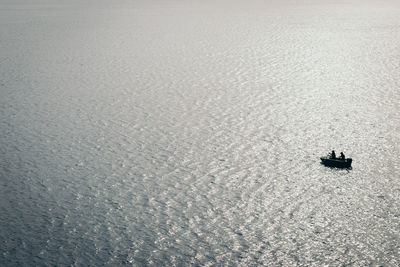 High angle view of boat sailing on sea