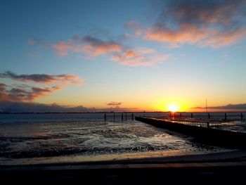 Scenic view of sunset over sea